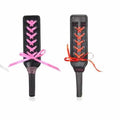 Corsette Paddle Black With Red Ribbon